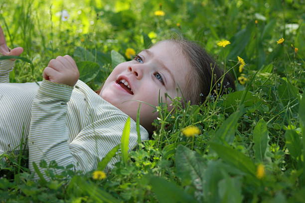 istock Little girl on a lawn 464982805