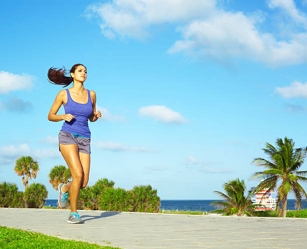 istock Pretty Mixed Race Woman Jogging 464983029