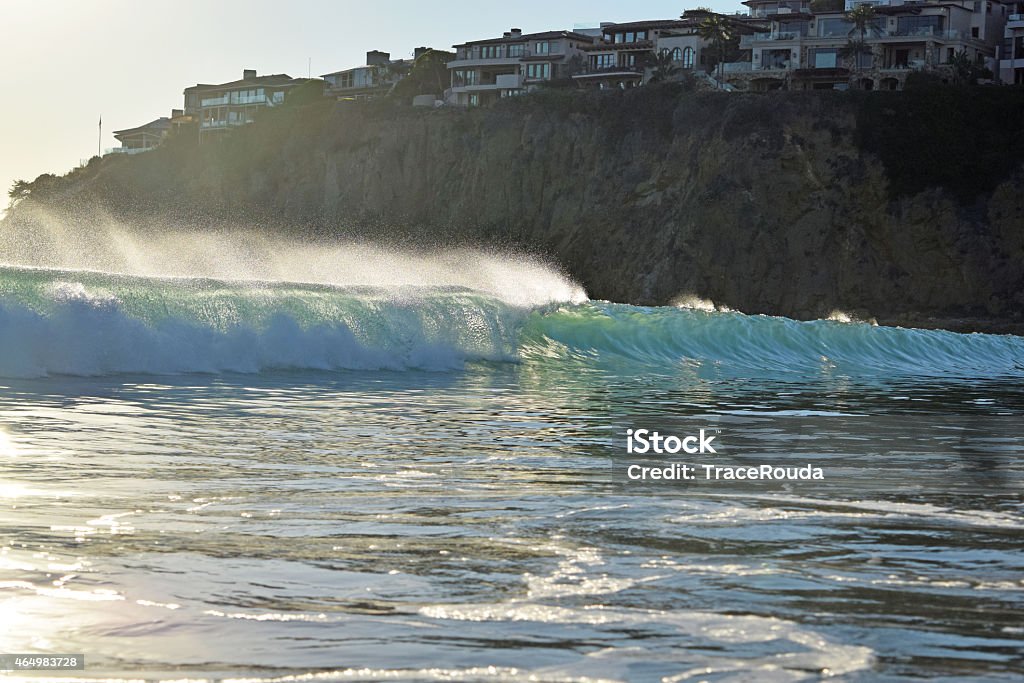 Laguna Beach Sunset Waves A view of waves in (Emerald Bay) Laguna Beach during sunset. Laguna is a beach community in Southern, California. A view of waves in (Emerald Bay) Laguna Beach during sunset. Laguna is a beach community in Southern, California.  2015 Stock Photo