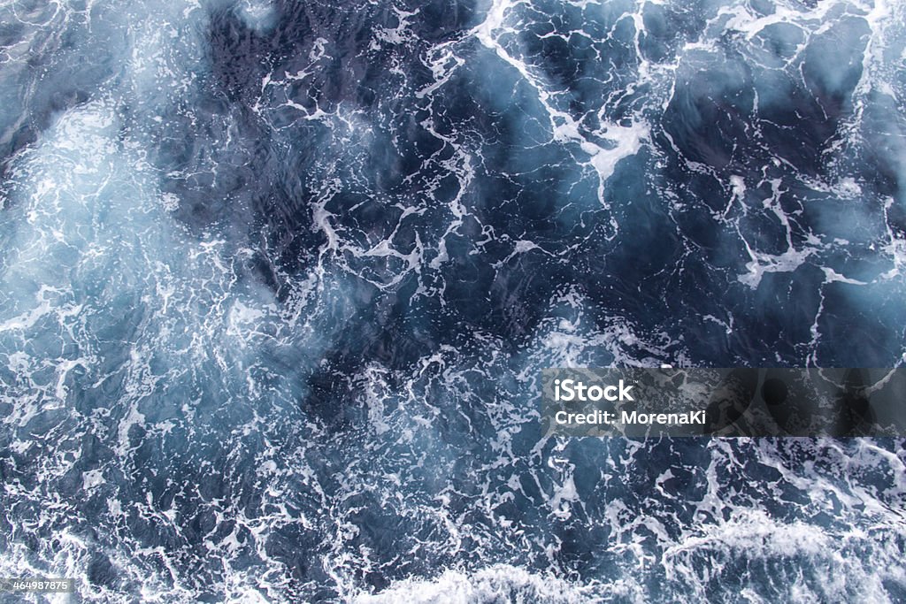 Background sea waves Background blue waves of the sea with sea foam Backgrounds Stock Photo