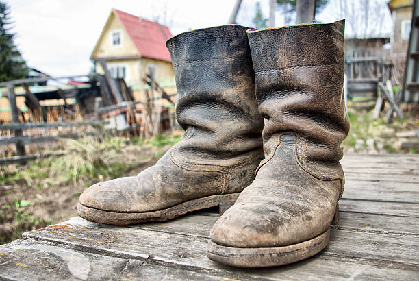 istock old muddy farmers boots 464988827