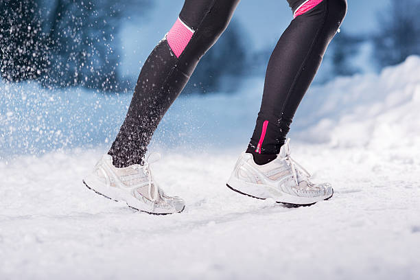 istock Winter running woman 464989703