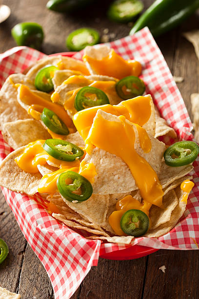 istock Homemade Nachos with Cheddar Cheese 464989966