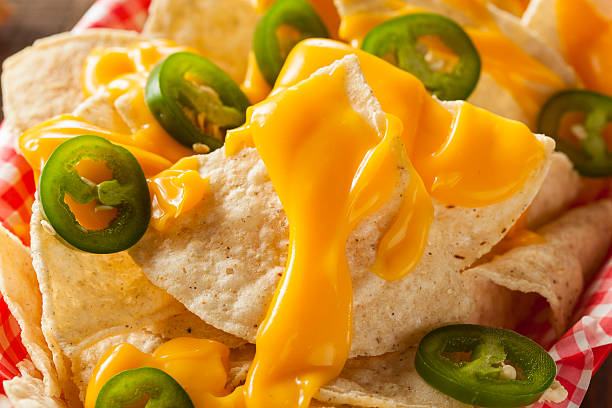 istock Homemade Nachos with Cheddar Cheese 464989968
