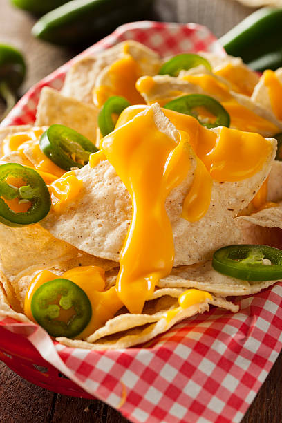 istock Homemade Nachos with Cheddar Cheese 464989970