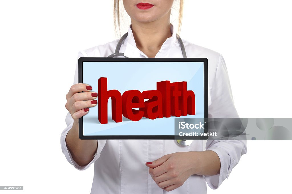 doctor holding touch pad young female doctor holding touch pad Adult Stock Photo