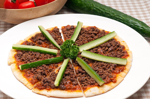 istock Turkish beef pizza with cucumber on top 464992047