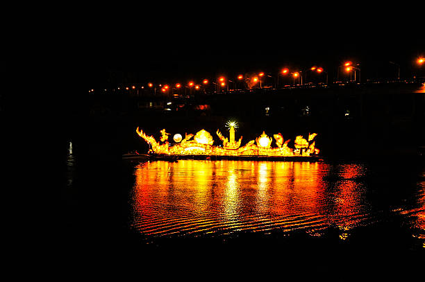 istock Illuminated boat festival in Isan 464992277