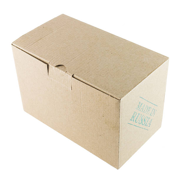 istock Cardboard box stamped MADE IN RUSSIA on white background 464993162