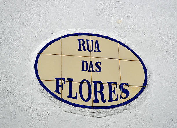 Tiles with the inscription of Rua das Flores in Alte Tiles with the inscription of Rua das Flores in Alte alte algarve stock pictures, royalty-free photos & images