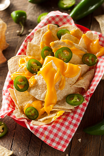 istock Homemade Nachos with Cheddar Cheese 464996084