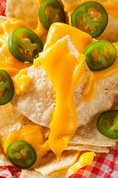 istock Homemade Nachos with Cheddar Cheese 464996092