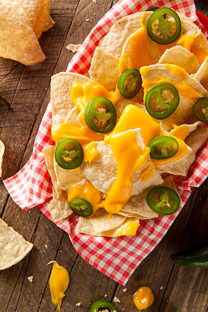 istock Homemade Nachos with Cheddar Cheese 464996096