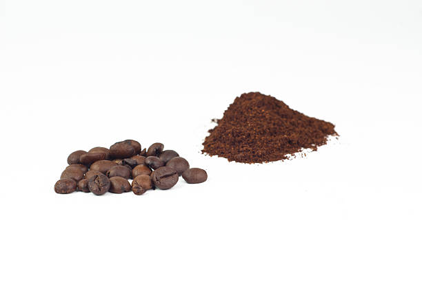istock Ground and roasted coffee beans on white background 464996277