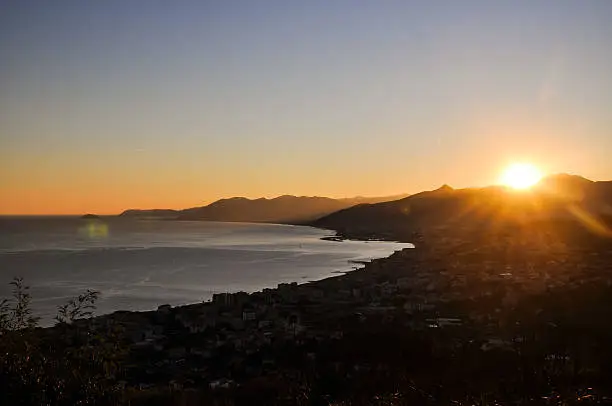 Stunning sunset view of the Ligurian coastline with seen from the town Borgio Verezzi.