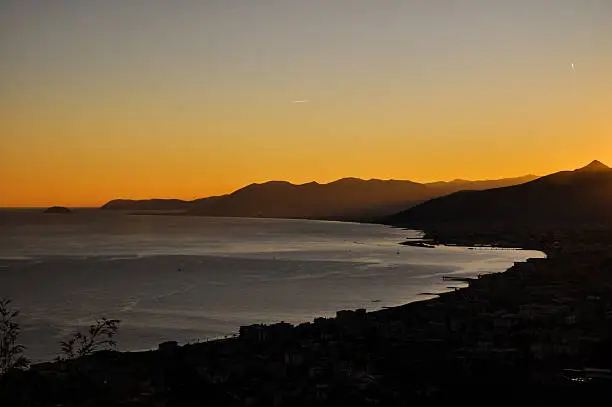 Stunning sunset view of the Ligurian coastline with seen from the town Borgio Verezzi.