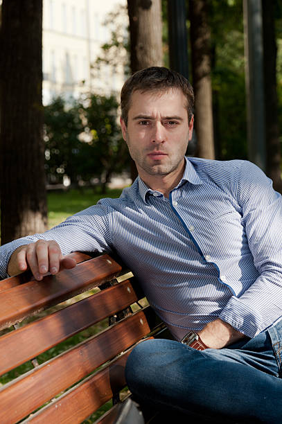 istock Man relaxing in the public garden 464996991