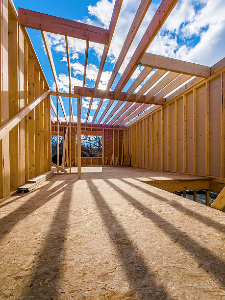 Interior of new house being framed during construction stock photo
