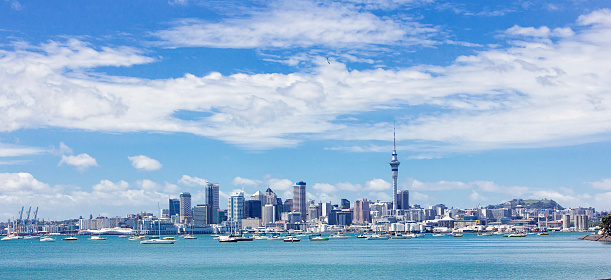 Extra wide angle horizontal view of beautiful Auckland, New Zealand. Skyline of this majestic city