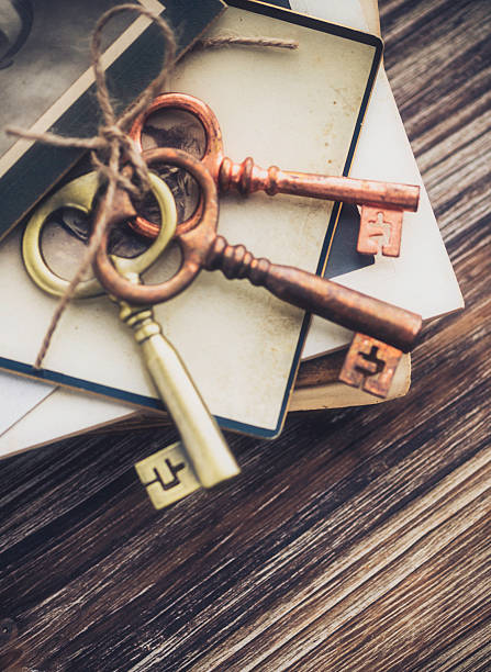 istock Nostalgic mementos. Old keys, diary and vintage photographs. 465006600
