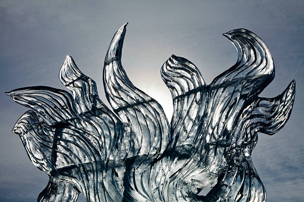 istock sculpted waves of ice with sunlight 465007388