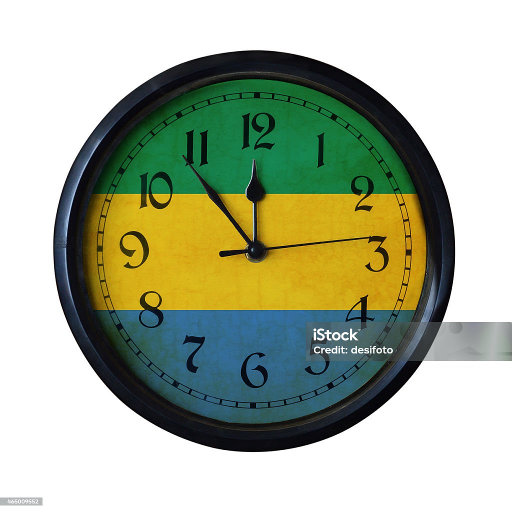 Gabon Flag Wall clock - Watch port for same series An old Gabon flag wall clock with grungy background - isolated over white. 2015 Stock Photo