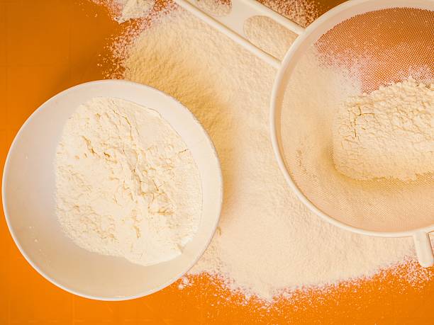 Preparation for baking, ingredients flour sifting.