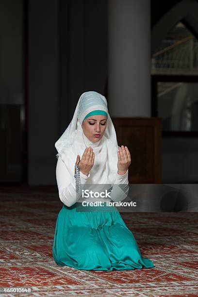 Humble Muslim Prayer Woman Stock Photo - Download Image Now - 2015, Adult, Adults Only