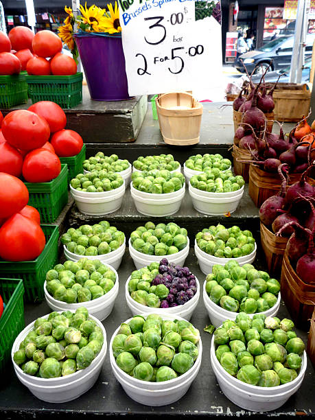 istock Green brussel sprouts in small containers 465010806