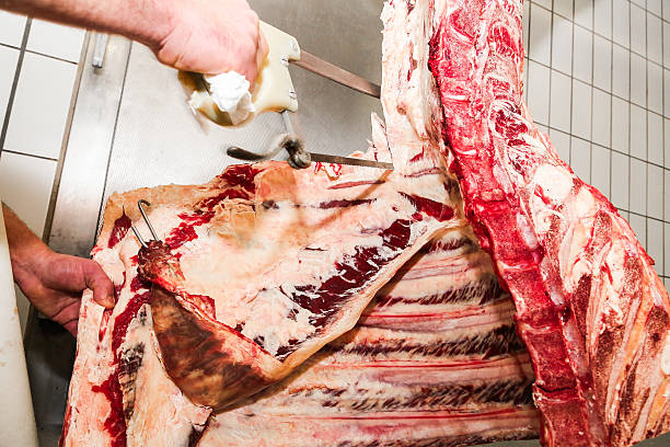 istock Butcher in a slaughterhouse 465010826