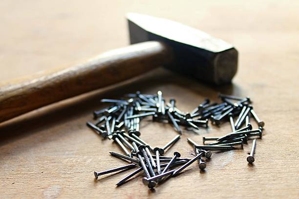ツールのショップのロマンス、ネイルと金槌 - construction construction material work tool nail ストックフォトと画像