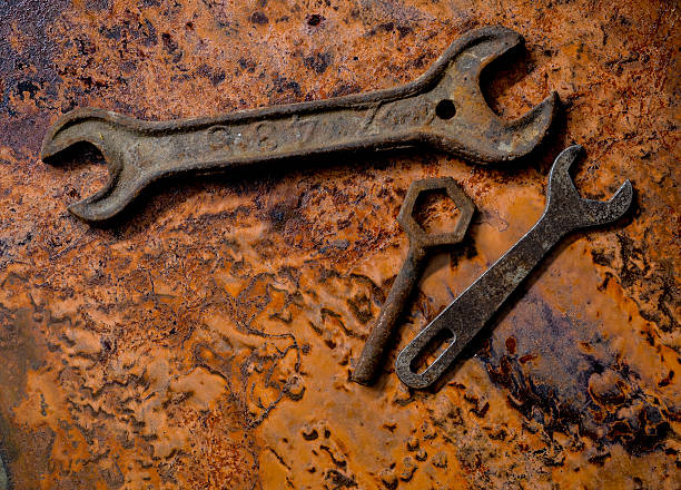 istock Background of rusty metal and various wrenches 465015634
