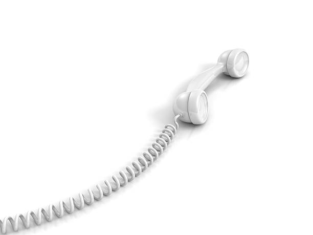 istock White telephone handset with spiral wire cable 465015833