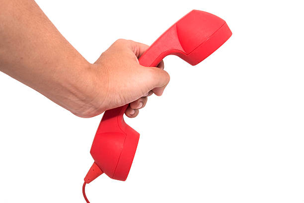istock Telephone receiver in hand isolated on a white background 465019466