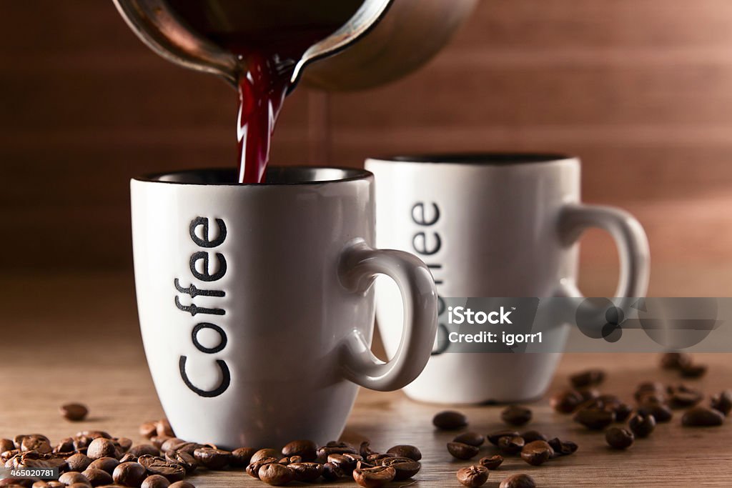 Hot morning coffee Hot morning coffee in a white cup Black Color Stock Photo