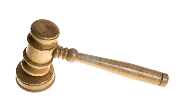 istock Wooden gavel resting on striker plate 465023754