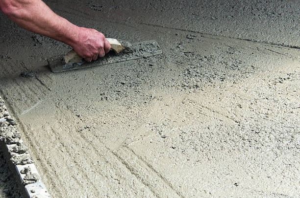 istock Worker finishing a concrete floor 465026902