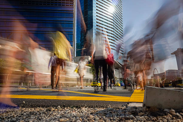 istock Blurred motion of workers crossing the traffic junction 465028868