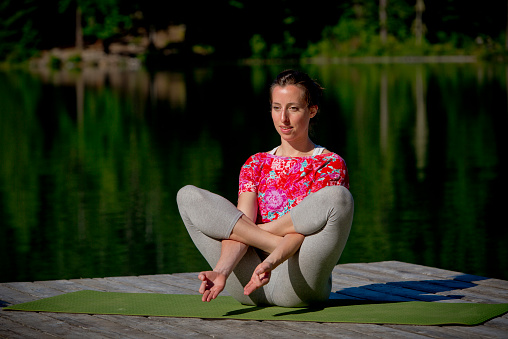 Meditation and yoga practice at sunset or sunrise.