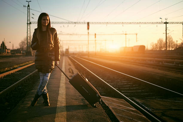 istock Young traveler woman in railway 465031864