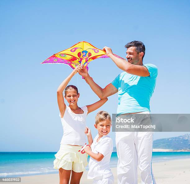 Boy And His Father With Kite Stock Photo - Download Image Now - 2015, Activity, Adult