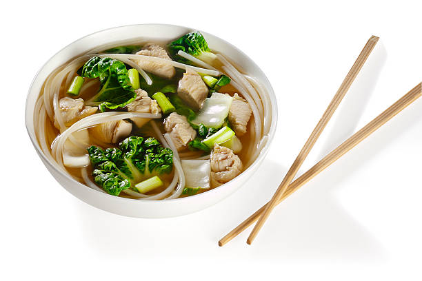 Asian chicken noodle soup on whitebackground with clipping paths stock photo