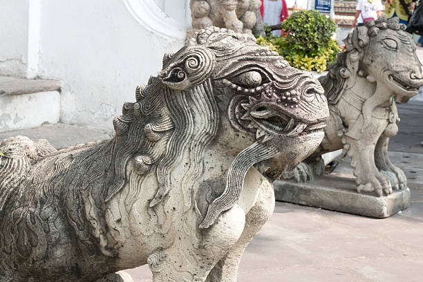 istock Male chinese stone lion statue 465035327
