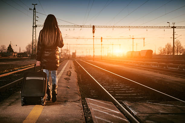 istock Young traveler woman in railway 465035868