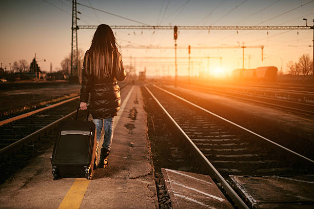istock Young traveler woman in railway 465035870