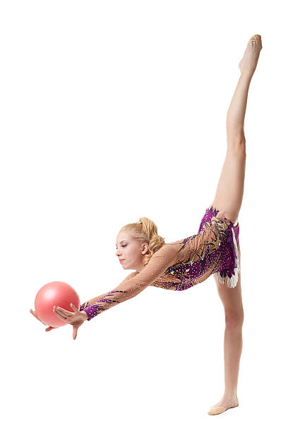 istock Beautiful female gymnast doing vertical split 465035926