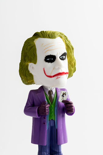 Istanbul, Turkey - February 28, 2015: Batman movie character's name is Joker. Toy is front white background.