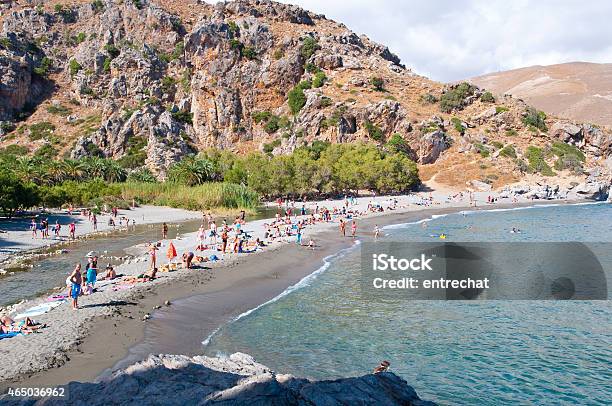 Tourists On The Preveli Beach On Crete Greece Stock Photo - Download Image Now - 2015, Beach, Beautiful People