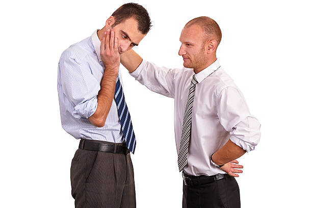 istock Two businessmen in shirts, troubled, one consoling, comforting 465037132
