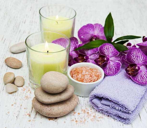 istock Candles, orcids and towels 465038756